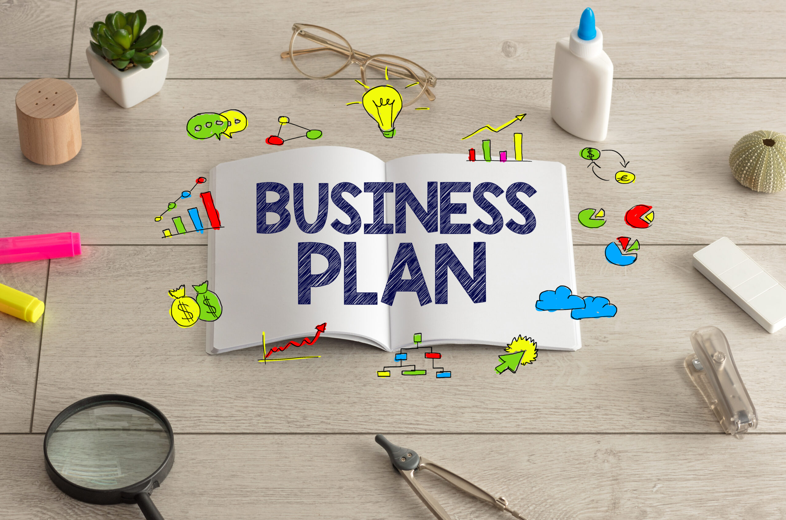 business plan concept with book and colorful sketc 2026 03 26 01 55 46 utc